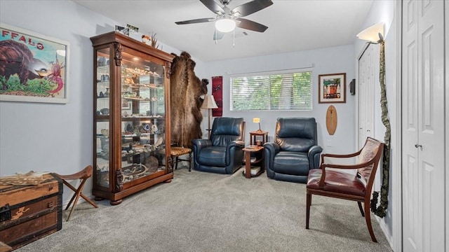 1925 Foxbriar Dr, Huntsville, TX 77340 - living area with carpet floors and ceiling fan