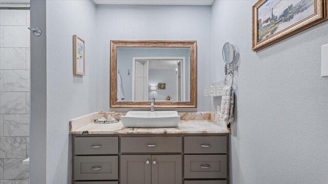 1925 Foxbriar Dr, Huntsville, TX 77340 - bathroom featuring vanity and a textured wall