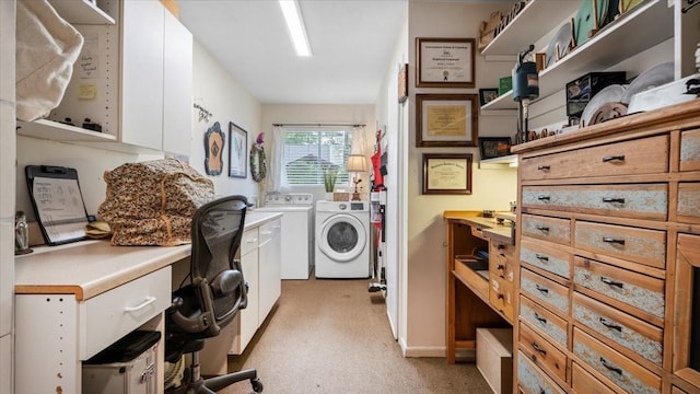 1925 Foxbriar Dr, Huntsville, TX 77340 - laundry area featuring separate washer and dryer, light colored carpet, a desk, and cabinet space