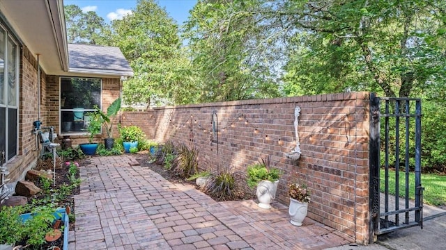 1925 Foxbriar Dr, Huntsville, TX 77340 - fenced backyard with a patio