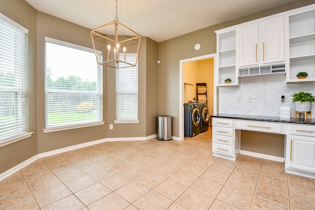 1638 Brookstone Ln, Sugar Land, TX 77479 - kitchen featuring open shelves, washing machine and dryer, dark countertops, and light tile patterned floors