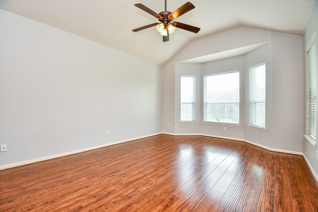 1638 Brookstone Ln, Sugar Land, TX 77479 - empty room with a ceiling fan, wood finished floors, vaulted ceiling, and baseboards