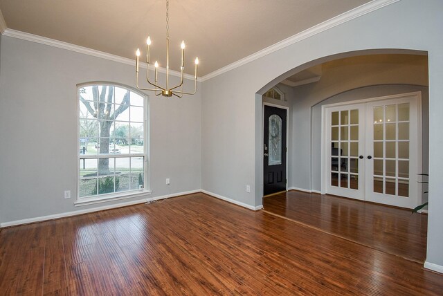 1638 Brookstone Ln, Sugar Land, TX 77479 - unfurnished room with french doors, wood finished floors, a chandelier, baseboards, and ornamental molding