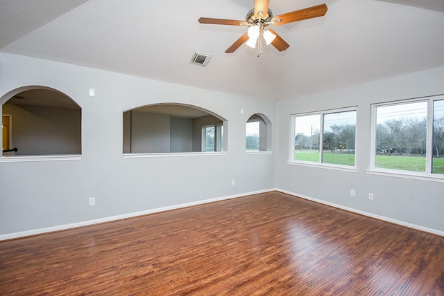 1638 Brookstone Ln, Sugar Land, TX 77479 - spare room featuring wood finished floors, healthy amount of natural light, lofted ceiling, ceiling fan, and baseboards