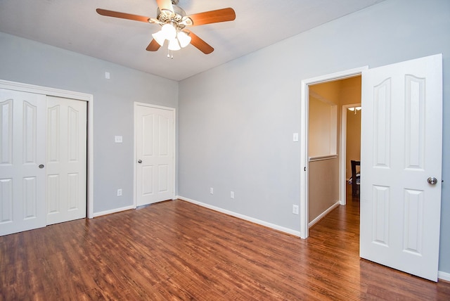 1638 Brookstone Ln, Sugar Land, TX 77479 - unfurnished bedroom with wood finished floors, baseboards, ceiling fan, and a closet