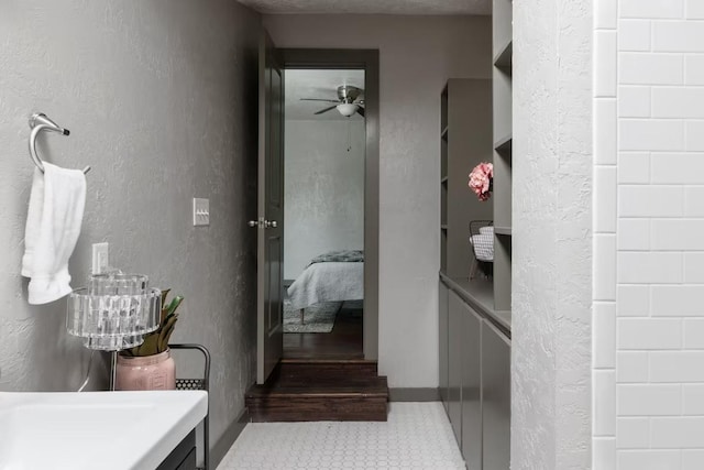 1017 Milner, College Station, TX 77840 - ensuite bathroom featuring ceiling fan and vanity