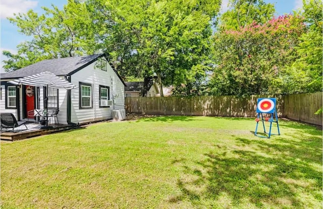1017 Milner, College Station, TX 77840 - view of yard featuring cooling unit and a deck