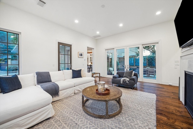 523 E 23rd St, Houston, TX 77008 - living room featuring wood finished floors, recessed lighting, and a fireplace