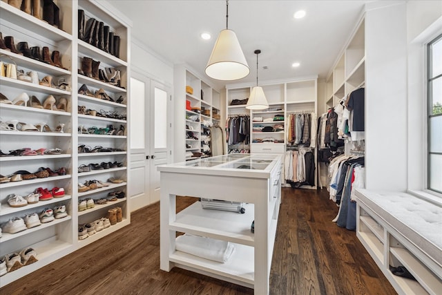523 E 23rd St, Houston, TX 77008 - spacious closet featuring dark wood-style flooring