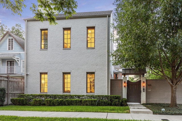 523 E 23rd St, Houston, TX 77008 - view of front of home with a gate and brick siding