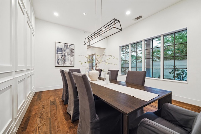 523 E 23rd St, Houston, TX 77008 - dining room featuring recessed lighting, dark wood finished floors, and baseboards