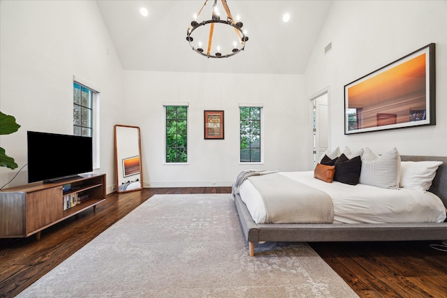 523 E 23rd St, Houston, TX 77008 - bedroom featuring high vaulted ceiling, a chandelier, multiple windows, wood finished floors, and recessed lighting