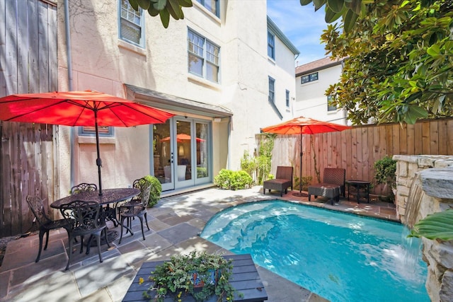 2207 Dunraven Ln, Houston, TX 77019 - view of swimming pool featuring french doors and a patio