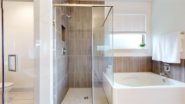 3539 Gore Creek Dr, Katy, TX 77494 - full bath featuring a stall shower, a bath, toilet, and tile patterned flooring