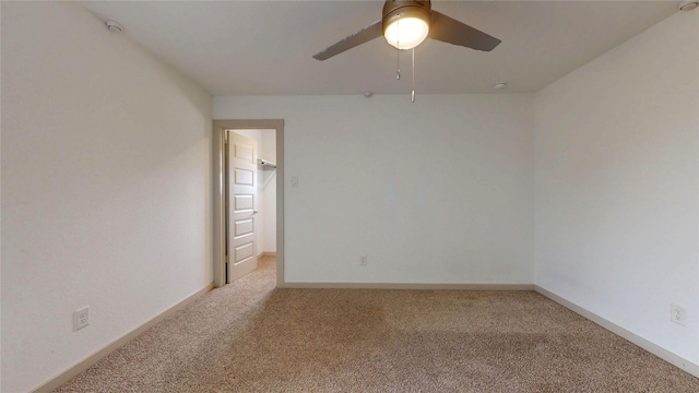3539 Gore Creek Dr, Katy, TX 77494 - spare room featuring light carpet, a ceiling fan, a smoke detector, and baseboards