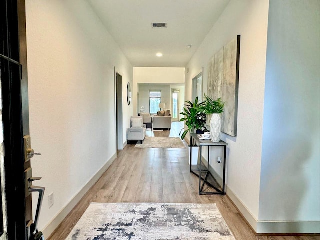 3539 Gore Creek Dr, Katy, TX 77494 - hall featuring wood finished floors and baseboards