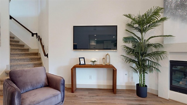 3539 Gore Creek Dr, Katy, TX 77494 - living area featuring wood finished floors, stairs, and baseboards