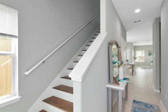 414 Armstrong St, Houston, TX 77029 - staircase featuring baseboards, recessed lighting, and tile patterned floors