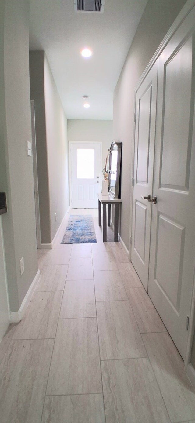 414 Armstrong St, Houston, TX 77029 - hallway featuring baseboards
