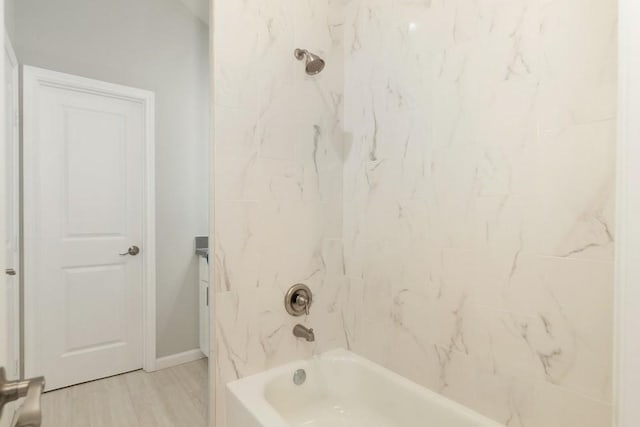 414 Armstrong St, Houston, TX 77029 - bathroom with tub / shower combination and baseboards