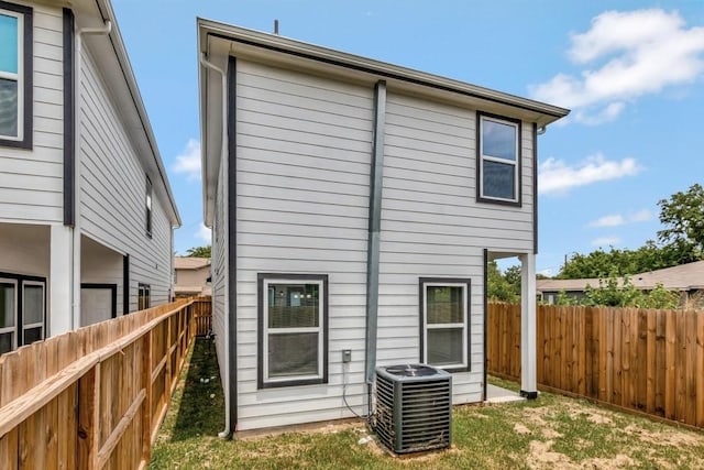 414 Armstrong St, Houston, TX 77029 - rear view of property featuring central air condition unit and a fenced backyard