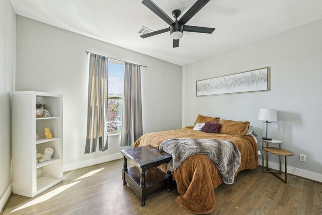 7015 Roswell St, Houston, TX 77022 - bedroom with wood finished floors and a ceiling fan