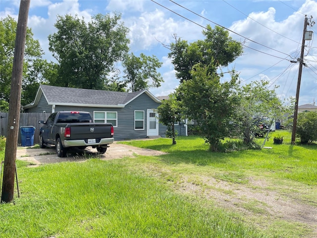 103 Prewitt Ln, West Columbia, TX 77486 - view of front facade with driveway and roof with shingles