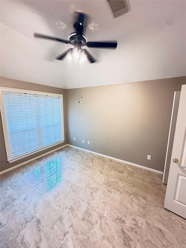 4306 Dow Way, Pasadena, TX 77505 - unfurnished room featuring baseboards and a ceiling fan