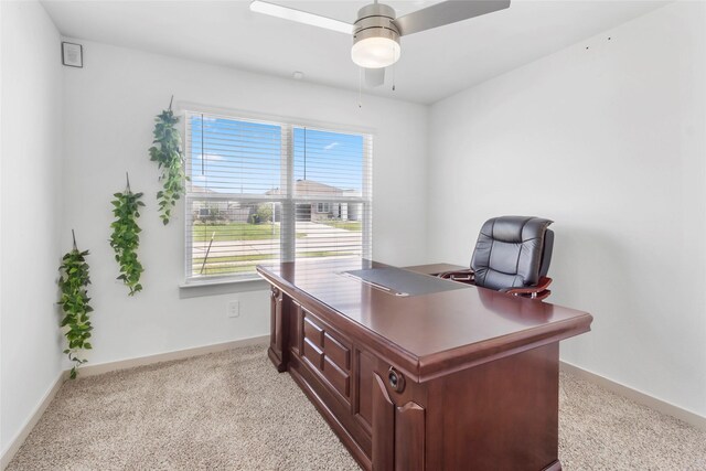 3434 Harper Meadow Ln, Missouri City, TX 77459 - office area featuring light carpet, baseboards, and ceiling fan