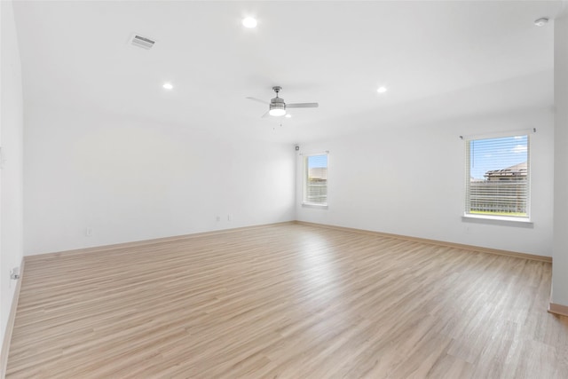 3434 Harper Meadow Ln, Missouri City, TX 77459 - empty room featuring light wood-type flooring, a ceiling fan, baseboards, and recessed lighting