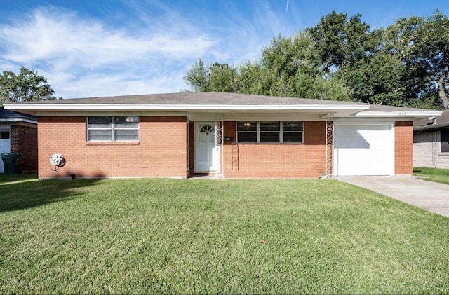 1908 Peachwood Dr, Pasadena, TX 77502 - ranch-style home with a garage, brick siding, concrete driveway, and a front lawn