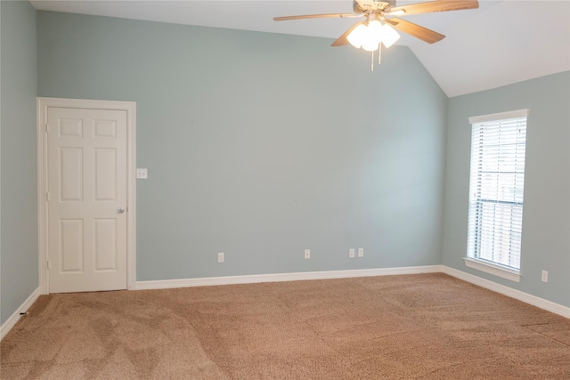 1818 Janell Rene Cir, Deer Park, TX 77536 - empty room with light colored carpet, a ceiling fan, lofted ceiling, healthy amount of natural light, and baseboards