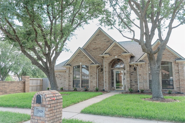 1818 Janell Rene Cir, Deer Park, TX 77536 - traditional-style house with brick siding and a shingled roof