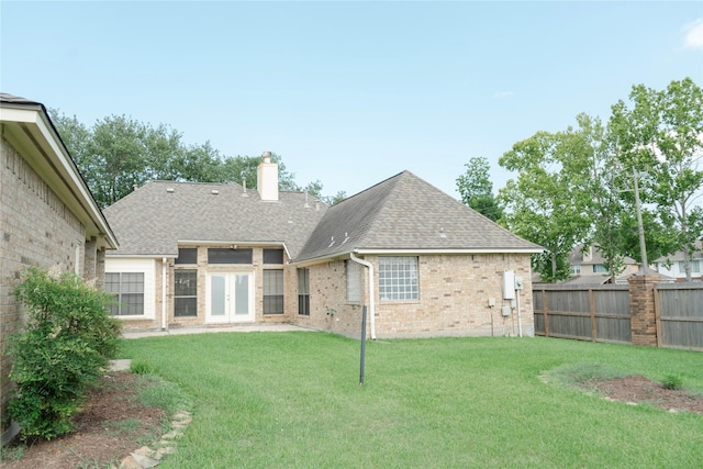 1818 Janell Rene Cir, Deer Park, TX 77536 - back of house with french doors, roof with shingles, brick siding, and a chimney