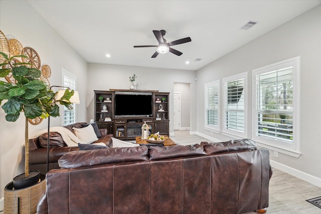 25747 Beaver Run Dr, Huffman, TX 77336 - living area featuring ceiling fan, light wood finished floors, baseboards, and recessed lighting