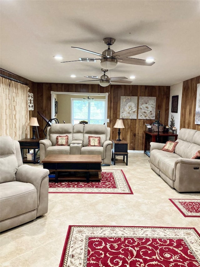 157 Rolling Hills Dr, Conroe, TX 77304 - living room featuring wood walls and a ceiling fan