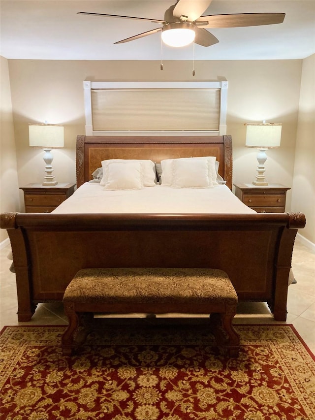 157 Rolling Hills Dr, Conroe, TX 77304 - bedroom featuring a ceiling fan, baseboards, and light tile patterned floors