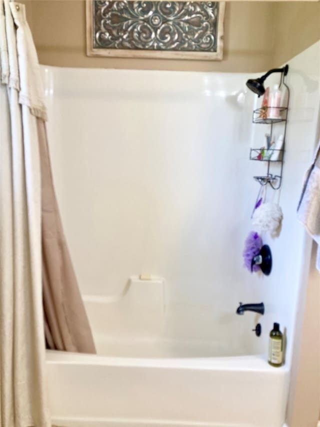 157 Rolling Hills Dr, Conroe, TX 77304 - bathroom featuring shower / tub combo