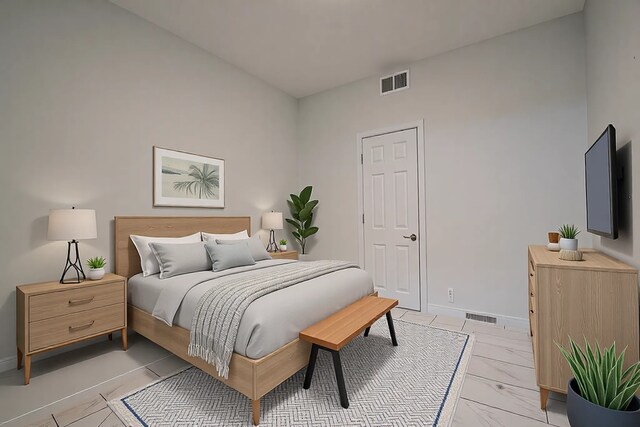 1818 Augusta Dr Unit 3, Houston, TX 77057 - bedroom with light marble finish flooring and baseboards