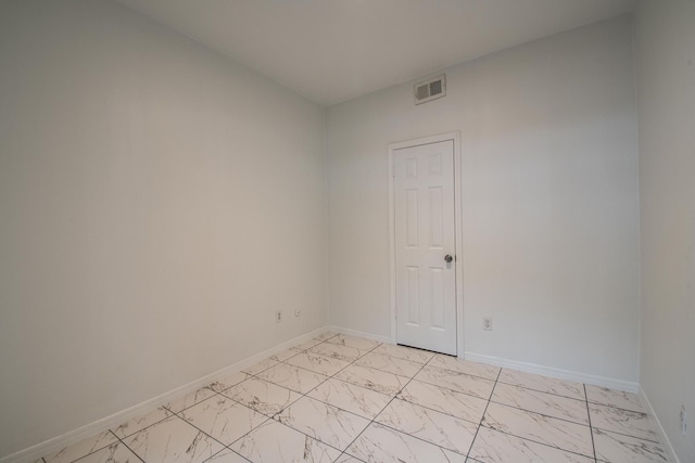 1818 Augusta Dr Unit 3, Houston, TX 77057 - unfurnished room featuring light marble finish floors and baseboards