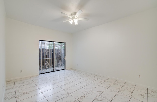 1818 Augusta Dr Unit 3, Houston, TX 77057 - empty room with light marble finish flooring, a ceiling fan, and baseboards