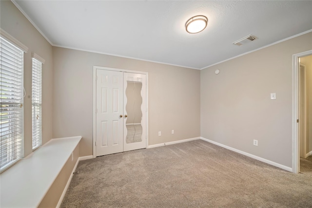 22519 Diamond Shore Ct, Katy, TX 77450 - carpeted spare room featuring crown molding and baseboards