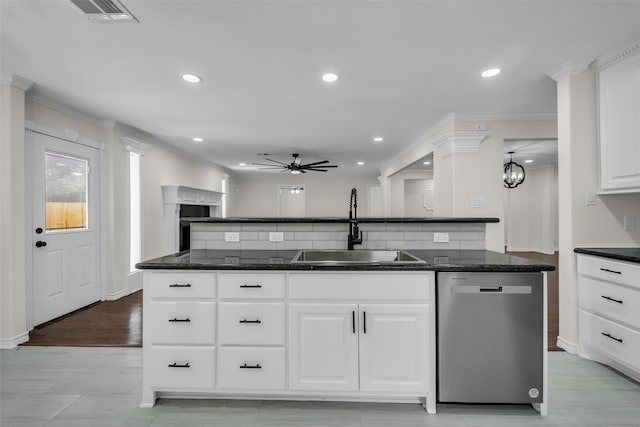 15905 Lakeview Dr, Jersey Village, TX 77040 - kitchen with dishwasher, ceiling fan, decorative backsplash, ornamental molding, and white cabinetry
