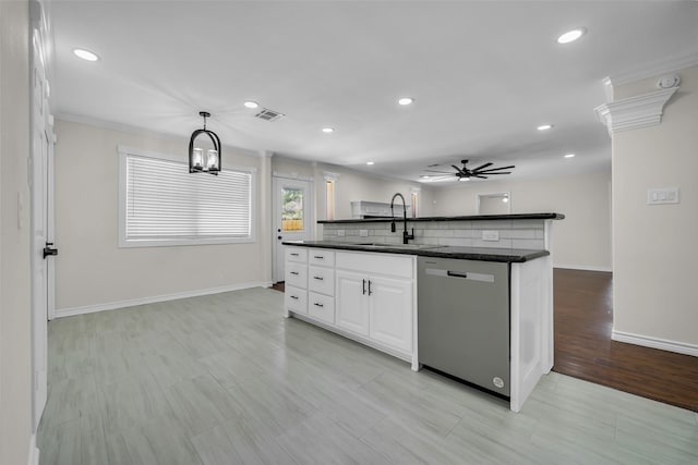 15905 Lakeview Dr, Jersey Village, TX 77040 - kitchen featuring dishwasher, dark countertops, a ceiling fan, white cabinets, and recessed lighting