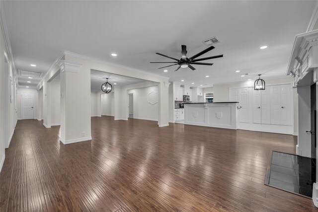 15905 Lakeview Dr, Jersey Village, TX 77040 - unfurnished living room featuring a ceiling fan, recessed lighting, dark wood finished floors, and crown molding