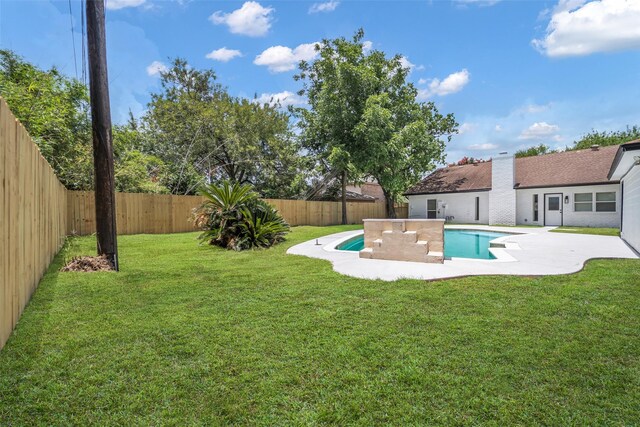 15905 Lakeview Dr, Jersey Village, TX 77040 - fenced backyard featuring a patio