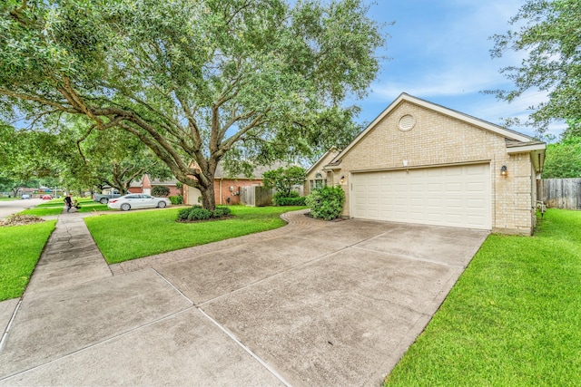 1722 Brook Grove Dr, Katy, TX 77450 - view of front of house featuring brick siding, driveway, and a garage