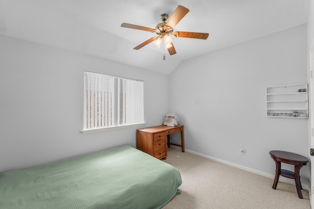 1722 Brook Grove Dr, Katy, TX 77450 - carpeted bedroom with vaulted ceiling, a ceiling fan, and baseboards