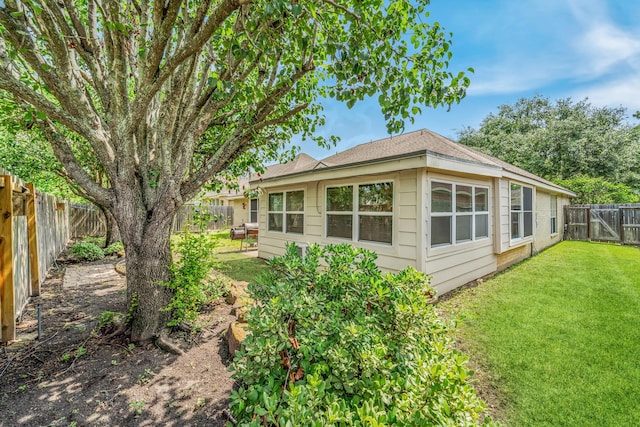 1722 Brook Grove Dr, Katy, TX 77450 - view of side of property featuring a shingled roof