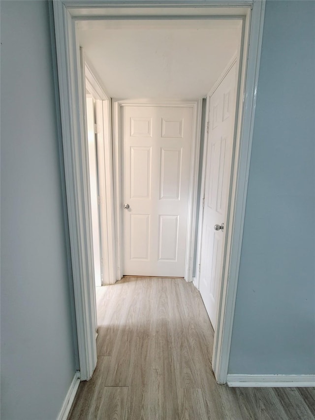 7900 Westheimer Rd Unit 255, Houston, TX 77063 - hall featuring wood finished floors and baseboards